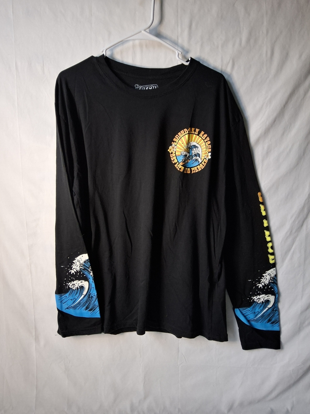 Black Long-Sleeve Graphic Tee with Blue Wave Accents